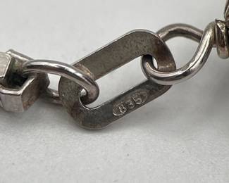 Closeup of clasp on sterling silver (835) box chain and bead necklace