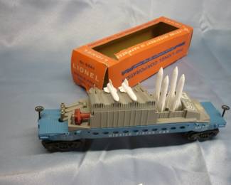Lionel Trains Missile Firing Car No. 6544, Post-War 1960-64, with original box and 4 missiles (#44-40), white stamped control panel, with instruction sheet