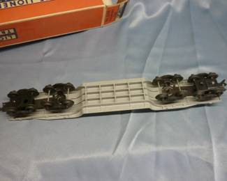 Another view of Lionel Trains Machinery Car (Girder Bridge Car) No. 6418, Post-War 1955-57, with two pink-orange US Steel bridge girders