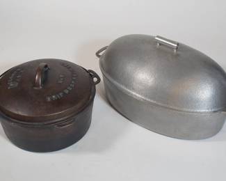 Cast iron Wagner Ware “Drip Drop Roaster” dutch oven No. 9, with lid & handle, and another larger oval shaped dutch oven roaster with lid & handle