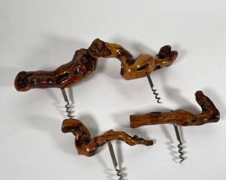 Another view of vintage wood handle corkscrew wine bottle openers, possibly German