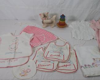 Closeup of the hand-made embroidered bibs