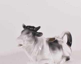 Antique German porcelain sitting Holstein cow creamer