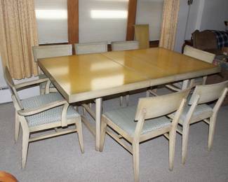 Another view of extendable dining table with chairs
