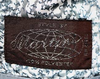 Label inside men's vintage three piece suit, pale silver blue