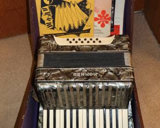 Vintage Hohner accordion with case, includes vintage accordion tutorial books