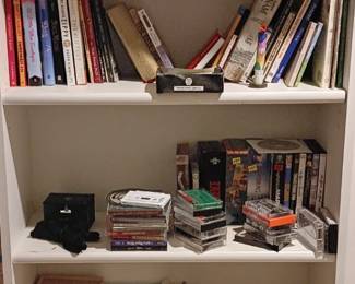 Books, CDs, DVDs, VHS, and vinyl