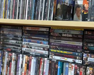 Mixture of DVDs and CDs. 