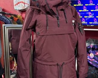 This is a Dope Snow jacket, a brand known for its stylish and functional ski and snowboard apparel. The jacket features a waterproof design, often rated between 15-20k, making it suitable for various weather conditions.