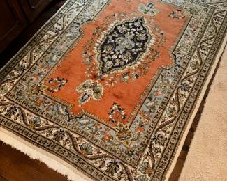Handmade knotted area rug