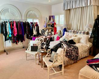 UPSTAIRS LADY'S ROOM WITH BEAUTIFUL FORMALS.