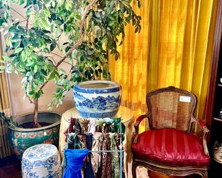 LARGE FISH BOWLS, BLUE AND WHITE STOOLS AND PLANTERS.