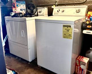 SPEED QUEEN WASHER AND DRYER KNOWN FOR ITS DURABILITY AND PERFORMANCE.