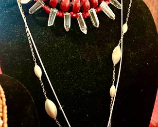 Coral cylinder bead necklace, quartz crystal.