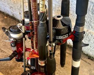 FISHING POLES RODS AND REELS.