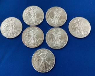 (7) SILVER UNC AMERICAN EAGLES