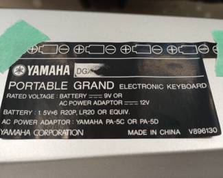 A Yamaha Portable Grand Electronic Keyboard, id tag,