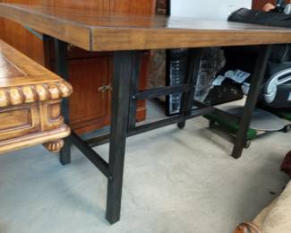 A Taller Table that goes with the 4 Tall Stools, and 1 Tall Bench, 