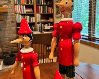 Mostly ca. 1980’s C2 Rainoldi wood Pinocchio figures, the tallest being 20” 