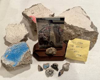 Pieces of the Berlin Wall chiseled in 1990.  The largest chunk is 7” wide