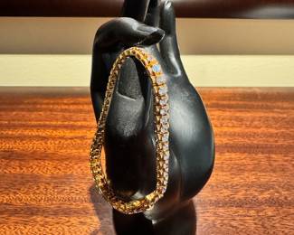 Gold plated sterling silver tennis bracelet set with cubic zirconia stones