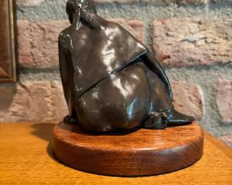 Small scale bronze sculpture of a Native American Woman by Lena Beth Frazier, numbered 41 out of 150