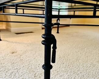 Vintage 40” x 40” iron coffee table, attributed to Baker Furniture