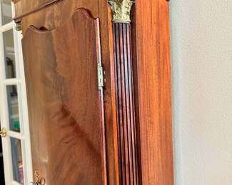 Incredible Mahogany wood long case grandfather clock ca. 1795 with hand painted enamel clock face with hunting depiction.  