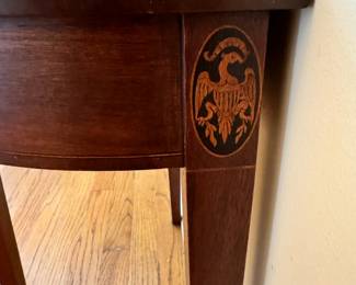 Vintage Kittinger mahogany half round table.  This piece measures 20”W x 21”T