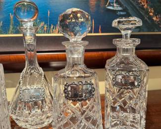 Great selection of vintage crystal decanters including a French Victorian style decanter by Baccarat and a wonderful set of 6 hallmarked Silver antique decanter tags (these will be sold as a set and separately from the decanters)