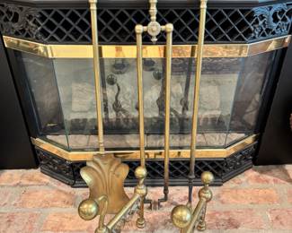 Antique European brass andiron set with fireplace tools