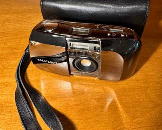 Olympus Infinity Stylus 35mm camera in Limited Edition Chrome with original leather case.  This is number 540 of 10,000