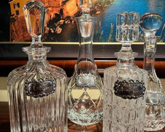 Great selection of vintage crystal decanters including a French Victorian style decanter by Baccarat and a wonderful set of 6 hallmarked Silver antique decanter tags (these will be sold as a set and separately from the decanters)