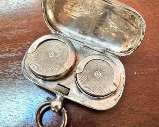 Small antique sterling silver trinkets, including pill boxes, match holder and double sovereign case