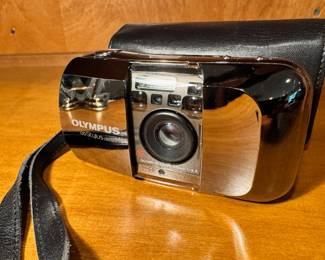 Olympus Infinity Stylus 35mm camera in Limited Edition Chrome with original leather case.  This is number 540 of 10,000
