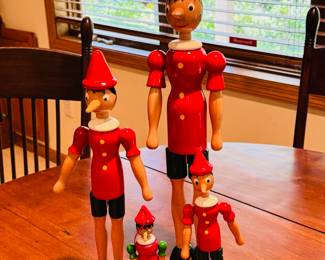 Mostly ca. 1980’s C2 Rainoldi wood Pinocchio figures, the tallest being 20” 