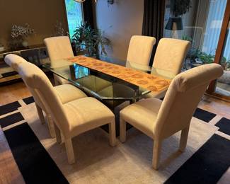 Glass dining room and 6 white chairs
Rug is also for sale.