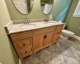 In upstairs bathroom - Must Remove and Move Yourself - We are not able to assist.