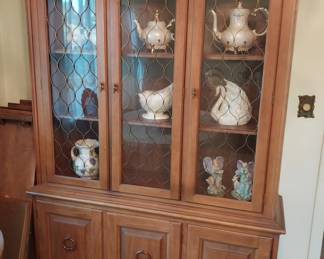 china cabinet, tea pots