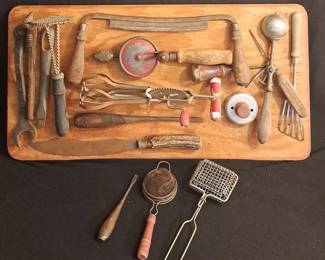 Kitchen Utencils On A Board