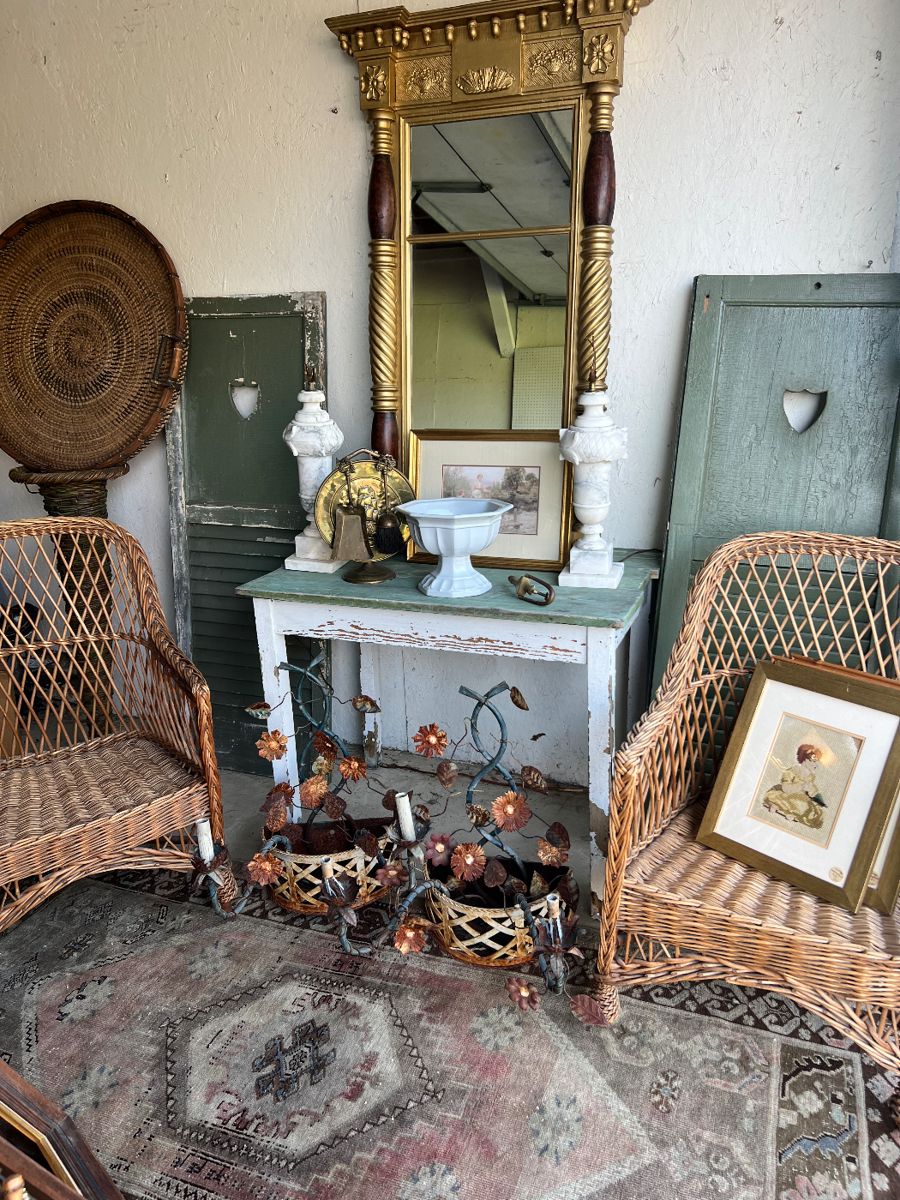 Vintage wicker chairs, antique tole wall sconces, pair alabaster lamps , vintage runner, antique shutters, English ironstone, sailboat brass fireplace set, vintage needlepoint pictures
