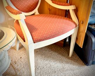 Pair of ivory wood-frame chairs with upholstery