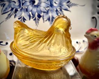 Amber glass hen on nest