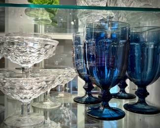 Vintage Fostoria sherbet bowls and blue glasses