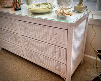 White wicker dresser with six drawers and glass top