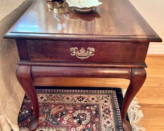 One of two vintage side tables