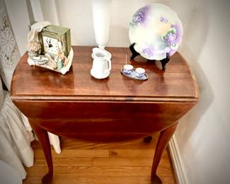 Vintage circular drop-leaf table