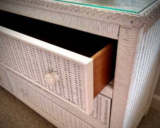 White wicker dresser with six drawers and glass top