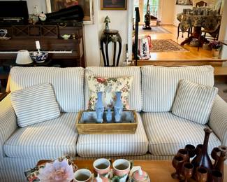 Light blue & white striped sofa