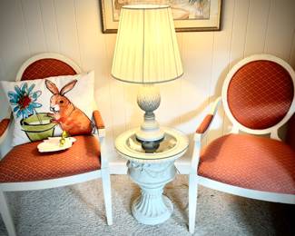 Pair of ivory wood-frame chairs with upholstery